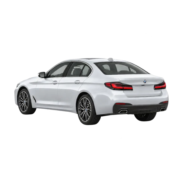 silver 2023 BMW 540i rear three-quarter (facing left) view