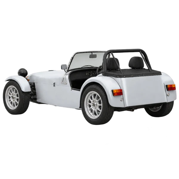 Caterham Super Seven 1997 prata, vista três quartos traseira (voltada para a esquerda)