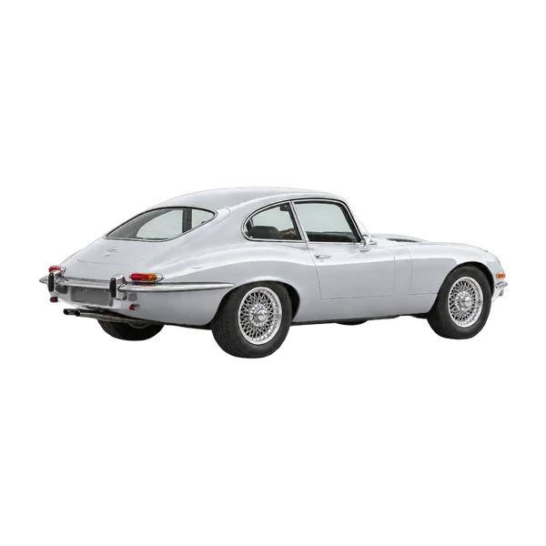 Jaguar E-Type 1990 باللون فضي، منظر منظر خلفي بزاوية ثلاثة أرباع (باتجاه اليمين)