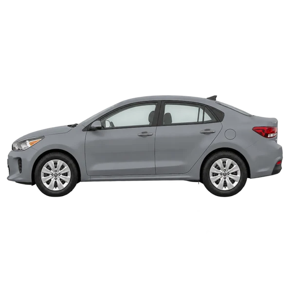 Kia Rio 2023 باللون رمادي، منظر جانبي (متجه إلى اليسار)