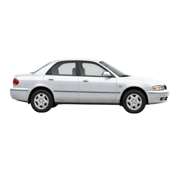 Mazda 626 1994 باللون فضي، منظر منظر جانبي (باتجاه اليمين)