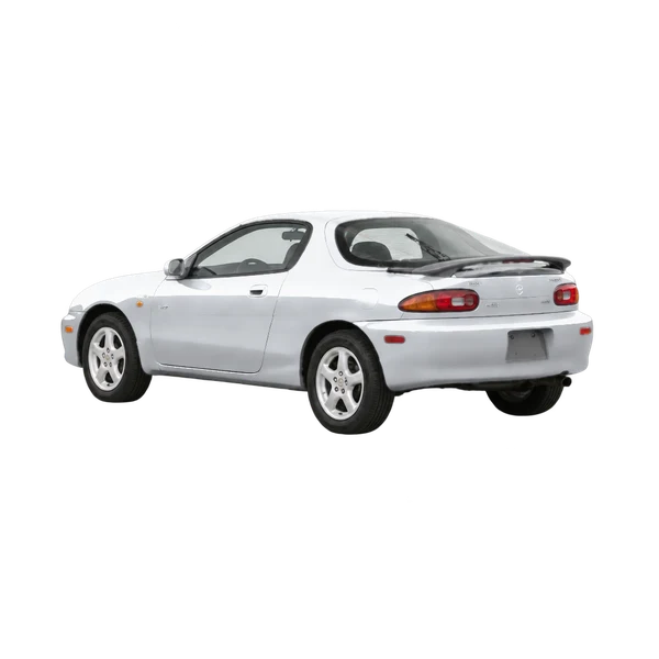 Mazda MX-3 1995 argent, vue trois-quarts arrière (orienté vers la gauche)