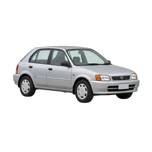 Toyota Corsa 1995 باللون فضي، منظر منظر أمامي بزاوية ثلاثة أرباع (متجه لليسار)