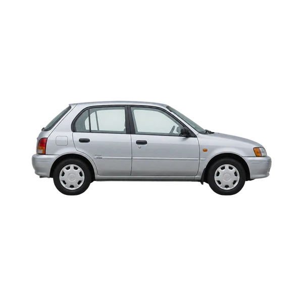 Toyota Corsa 1995 باللون فضي، منظر منظر جانبي (باتجاه اليمين)