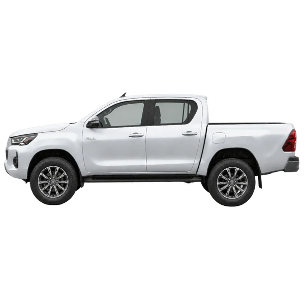 Toyota Hilux 2026 en plateado, vista lateral (mirando a la izquierda)