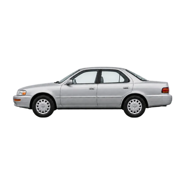Toyota Scepter 1995 باللون فضي، منظر جانبي (متجه إلى اليسار)