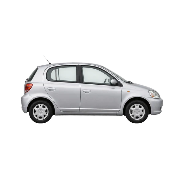Toyota Vitz 1995 en plateado, vista lateral (hacia la derecha)
